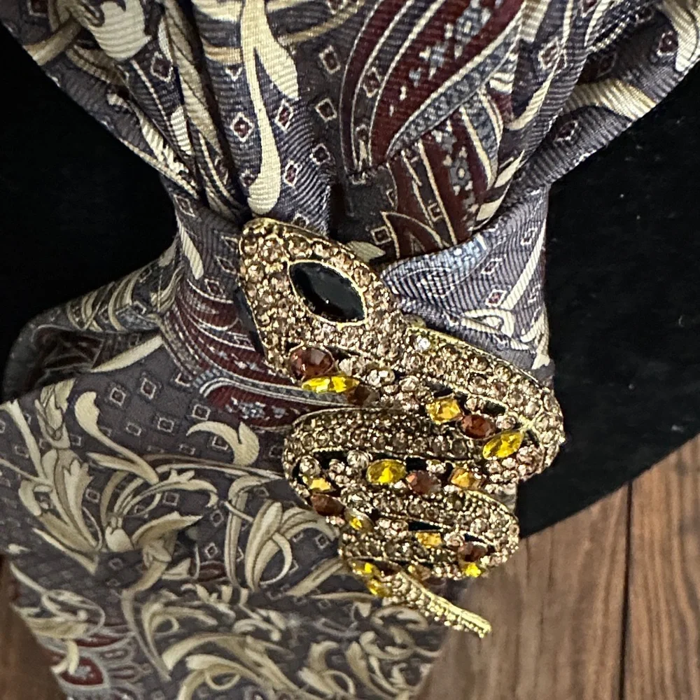 Elegant Paisley Silk Tie with Gold rhinestone snake on beaded necklace.